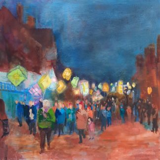 People carrying bright lanterns against a dark blue sky